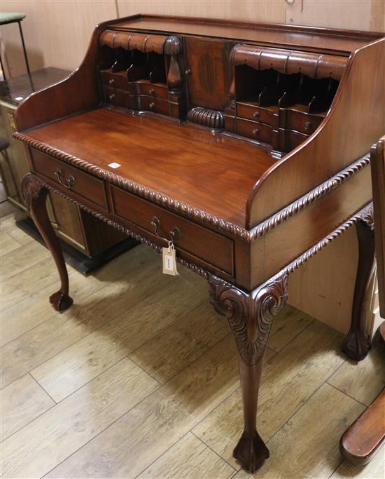 A Chippendale style mahogany writing desk W.107cm